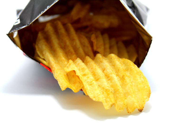 Snack Potato Chips Heaps on a White Background